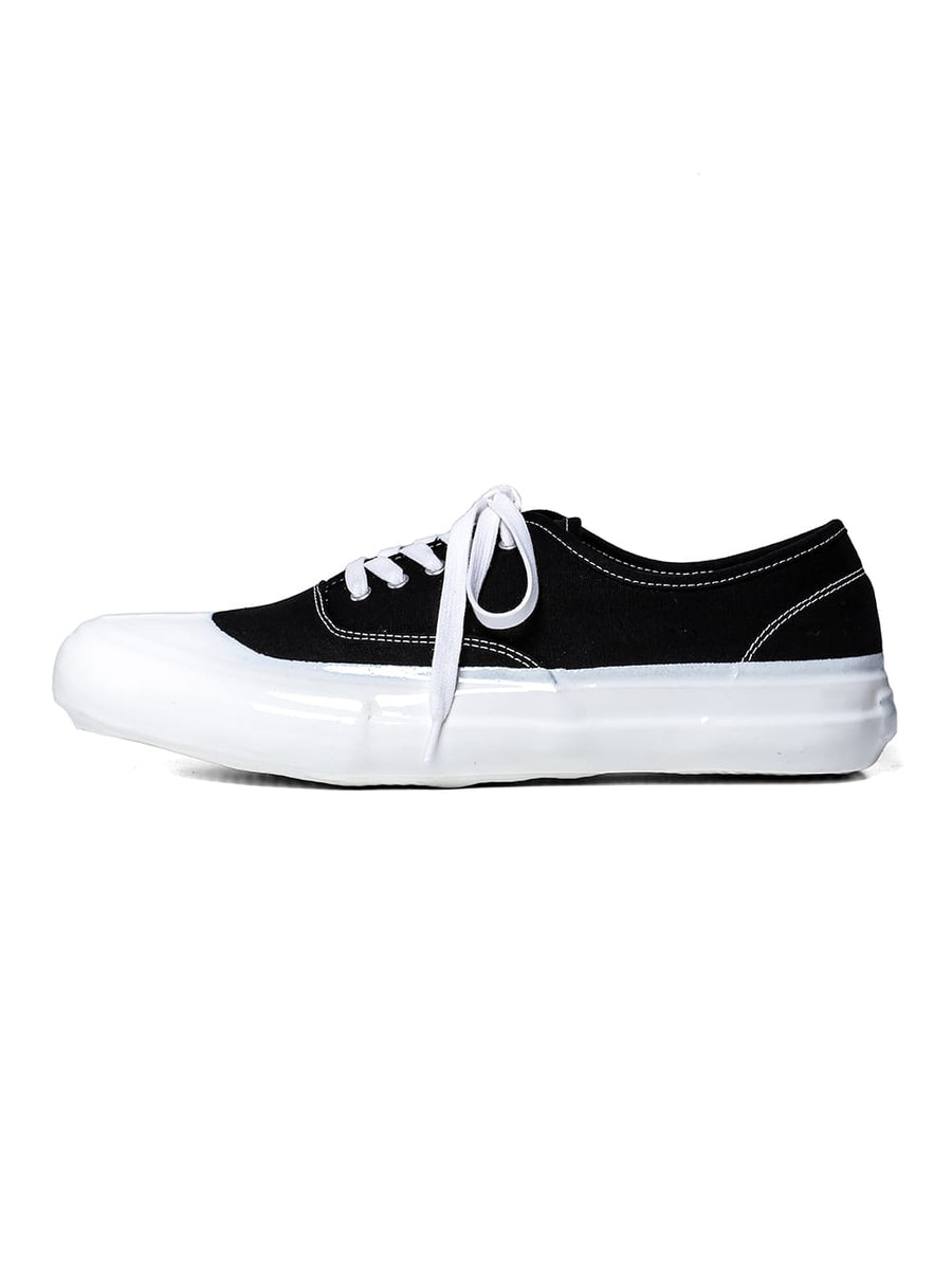 sf.0006AW25-black x white deck shoes. The Black-and-White Realism