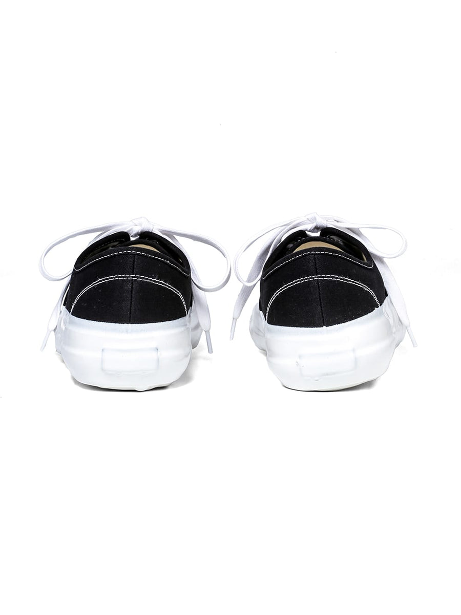 sf.0006AW25-black x white deck shoes. The Black-and-White Realism