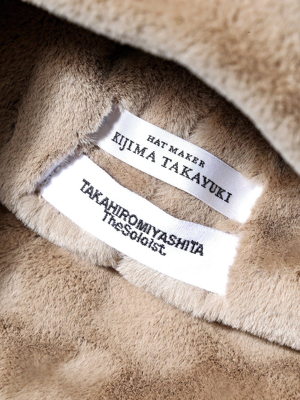 sa.0024AW25-beige bomber hat.(faux fur) The Black-and-White