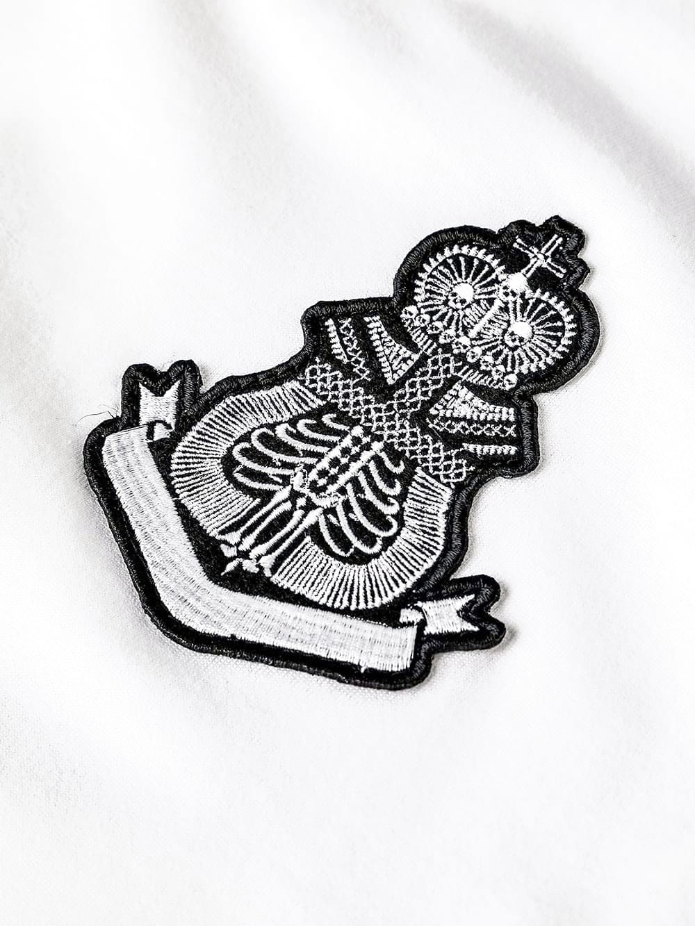 S logo and bone emblem. (s/s pocket tee)