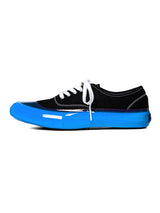 sf.0006AW25-black x blue deck shoes. The Black-and-White Realism