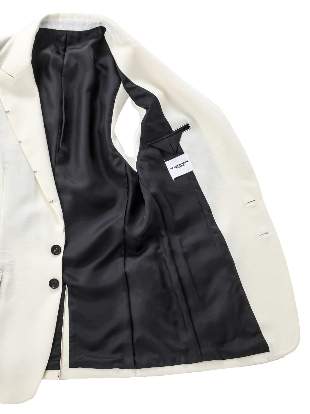 right - left sleeveless peaked lapel jacket.
