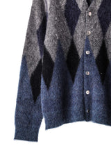 sk.0019AW25-navy カートカーディガン1 The Black-and-White Realism
